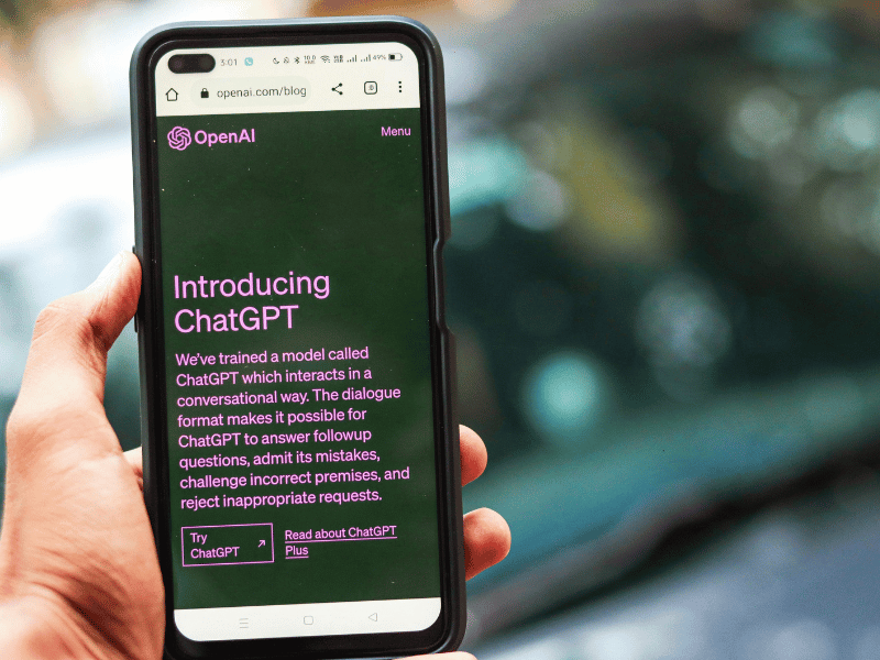 Comparison between AI and a solicitor reviewing legal documents highlighting risks of AI-generated contracts