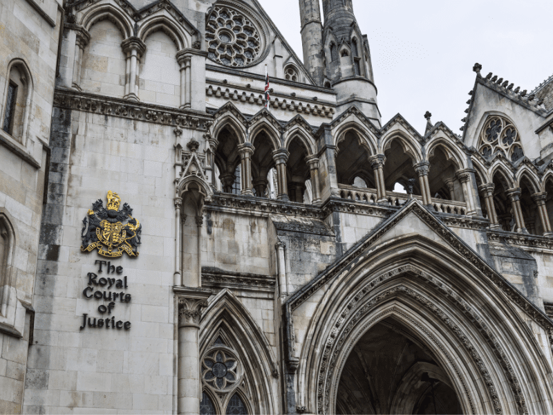 Legal professionals carrying out litigation work under supervision in a UK law firm